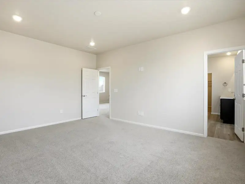 Spacious, unfurnished interior of a new home in Poudre Heights: The Alpine Collection, Windsor (Image 13).