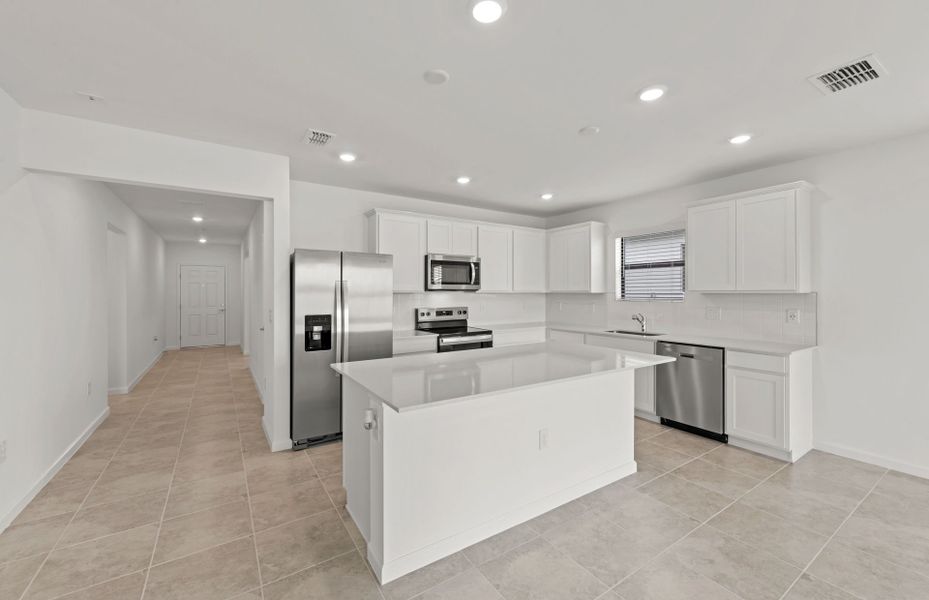 Furnished interior view inside a new home in Caloosa Cove, Labelle (Image 25).
