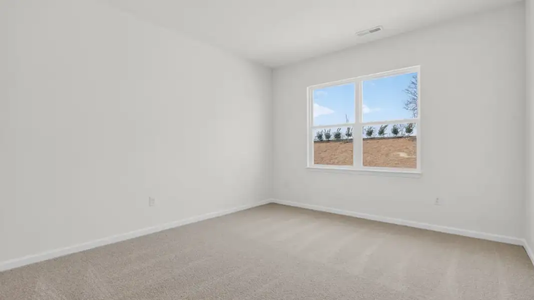 Spacious, unfurnished interior of a new home in Honeycutt Oaks, Angier (Image 28).