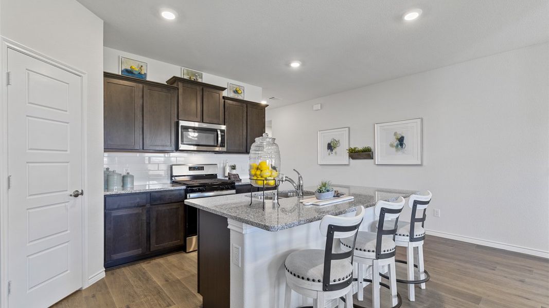 Representative furnished interior of a home built from the Ingleside by D.R. Horton in Windchime, Celina (Image 5).