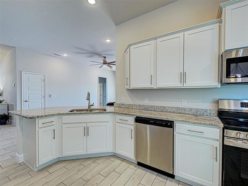 Furnished interior view inside a new home in Watercress Cove, North Port (Image 8).