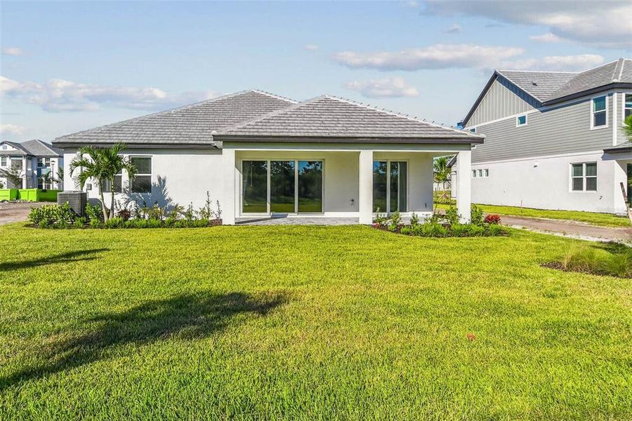 Exterior details and patio area of a home in Hawkstone, Sarasota (Image 2).