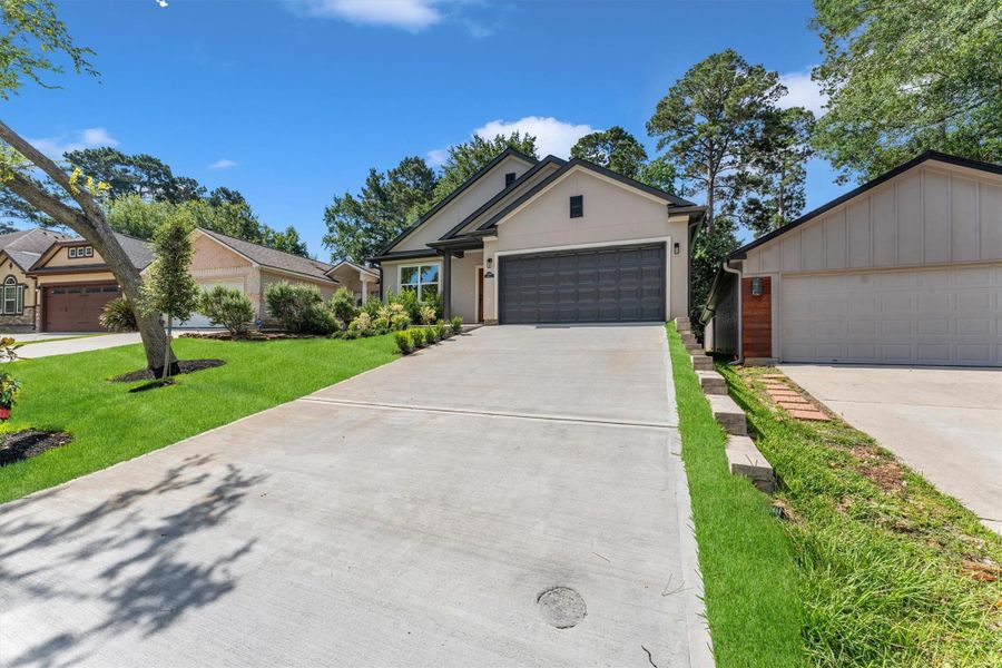 Front exterior of a new home in , Montgomery, TX, highlighting curb appeal (Image 29). Front exterior of a new home in , Montgomery, TX, highlighting curb appeal (Image 29).
