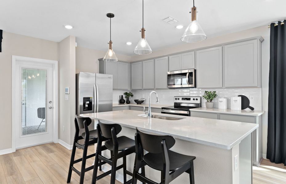 Furnished interior view inside a new home in EverBe, Orlando (Image 4).