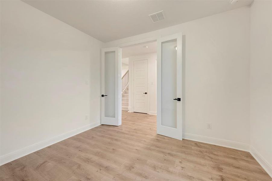 Spacious, unfurnished interior of a new home in Karis - Village Series, Crowley (Image 26).