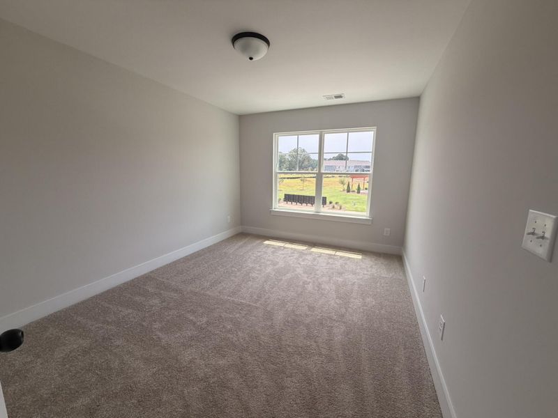 Spacious, unfurnished interior of a new home in Blythe Mill Townhomes, Waxhaw (Image 18).