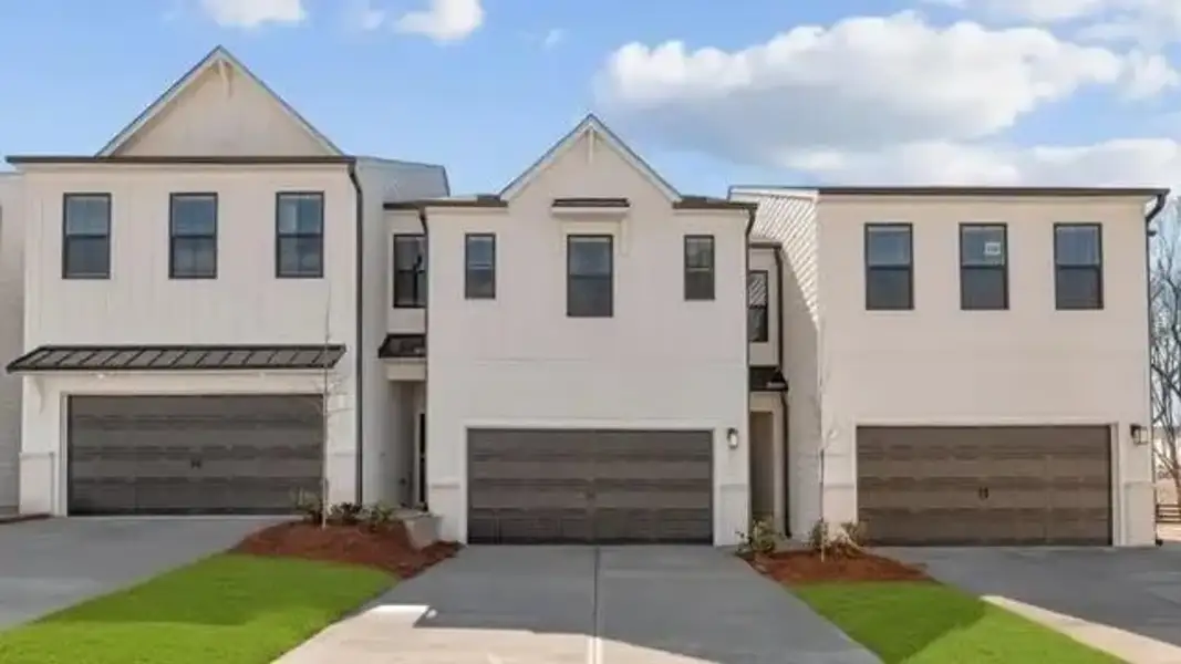 Front exterior of a new home in Sherwood Square, Flowery Branch, GA, highlighting curb appeal (Image 2). Front exterior of a new home in Sherwood Square, Flowery Branch, GA, highlighting curb appeal (Image 2).