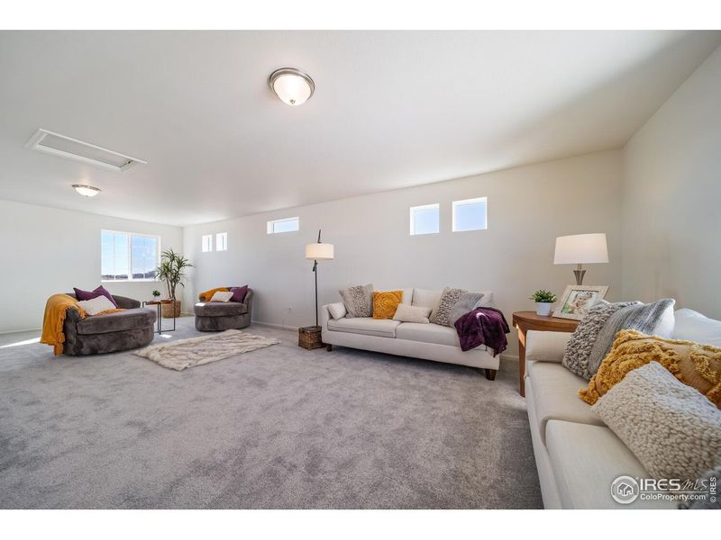 Furnished interior view inside a new home in Thompson River Ranch, Johnstown (Image 11).