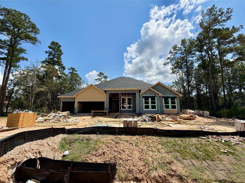 Front exterior of a new home in , Pinehurst, TX, highlighting curb appeal (Image 2).