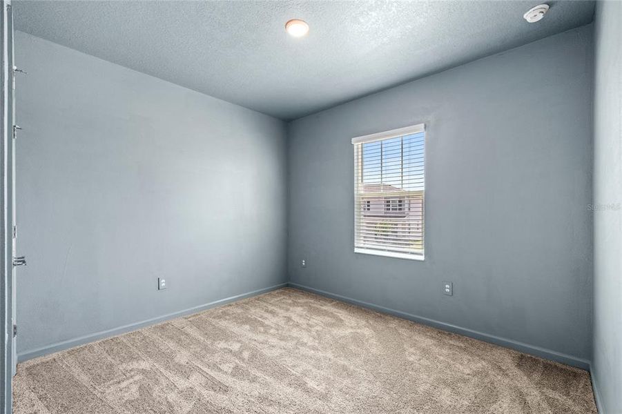 Spacious, unfurnished interior of a new home in Wellness Ridge, Clermont (Image 23).