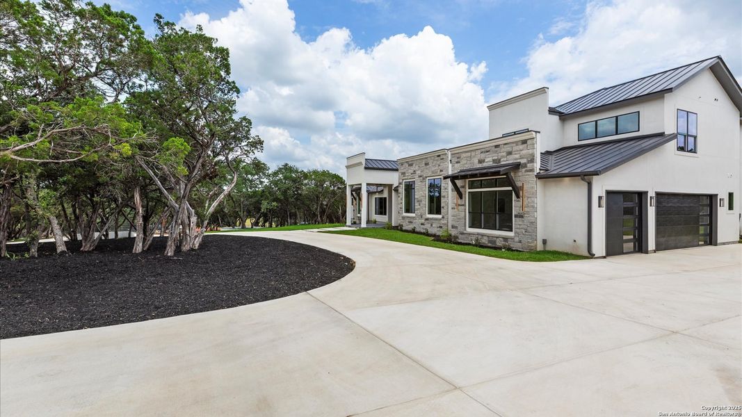Front exterior of a new home in , San Antonio, TX, highlighting curb appeal (Image 2).