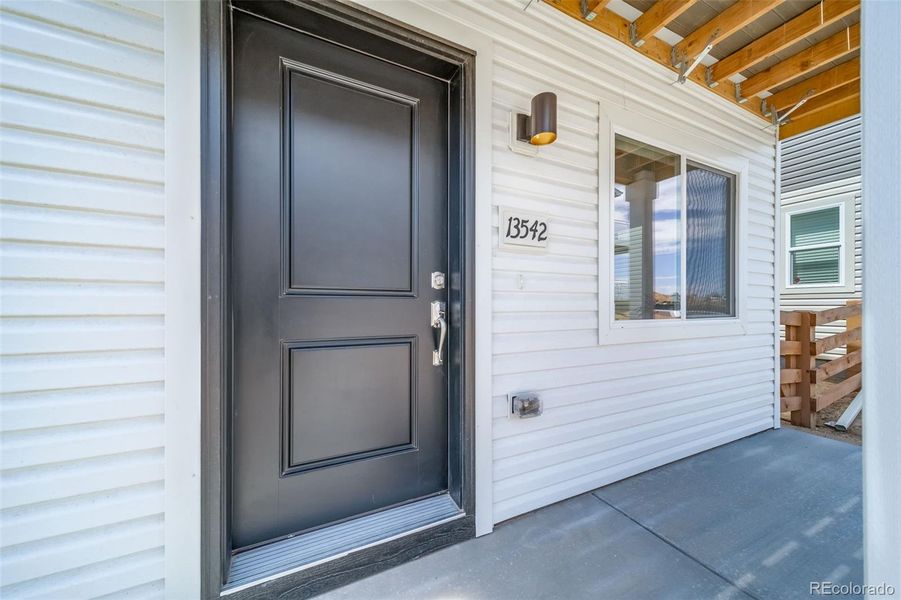 Exterior details and patio area of a home in , Commerce City (Image 3).