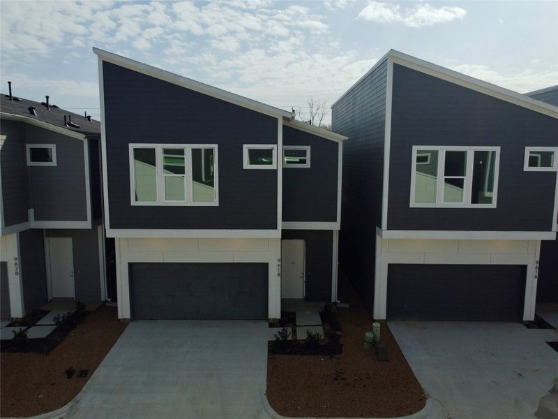 Front exterior of a new home in , Houston, TX, highlighting curb appeal (Image 2).
