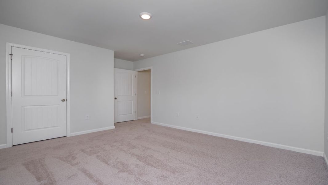 Spacious, unfurnished interior of a new home in Cedar Hill Landing, Navassa (Image 28).
