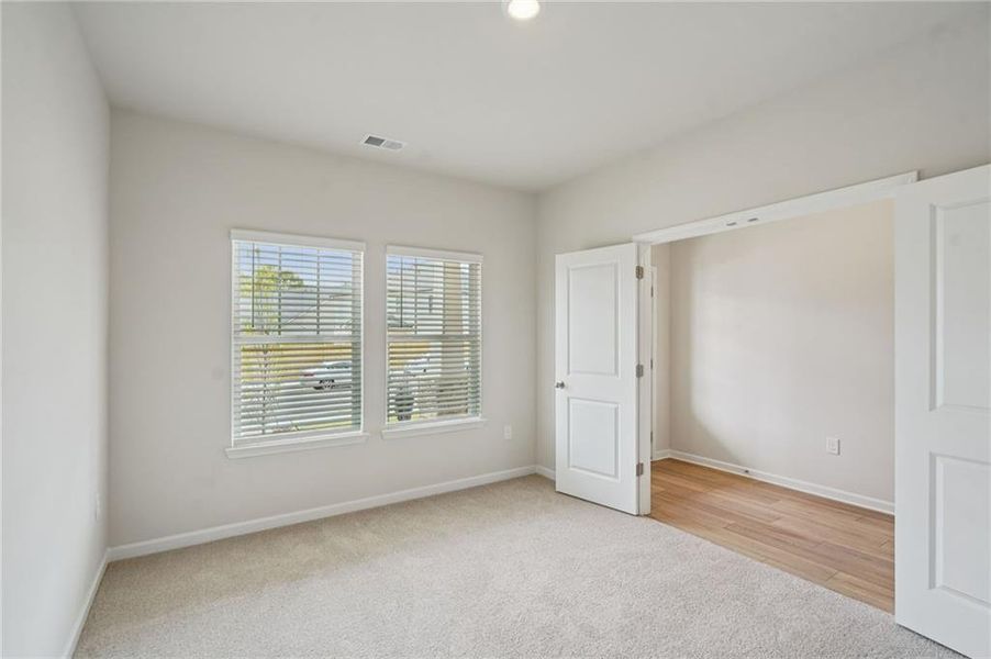 Spacious, unfurnished interior of a new home in Westmont Preserve, Powder Springs (Image 33).