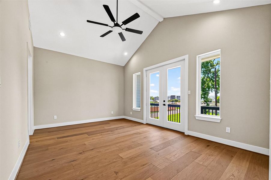 Primary bedroom suite featuring a private balcony. Primary bedroom suite featuring a private balcony.