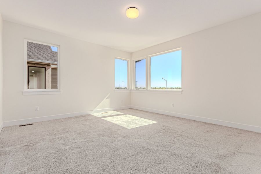 Spacious, unfurnished interior of a new home in West Grange, Longmont (Image 32).
