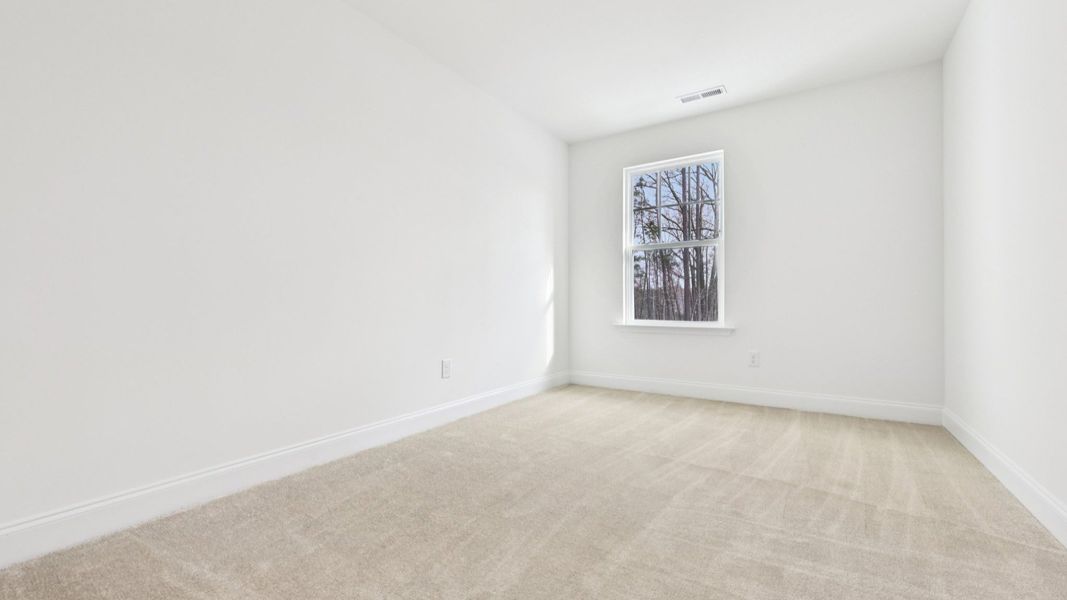 Furnished interior view inside a new home in Battle Bridge, Raleigh (Image 11).