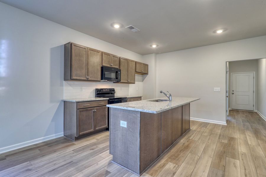 Furnished interior view inside a new home in Hainer Place, Conway (Image 8).