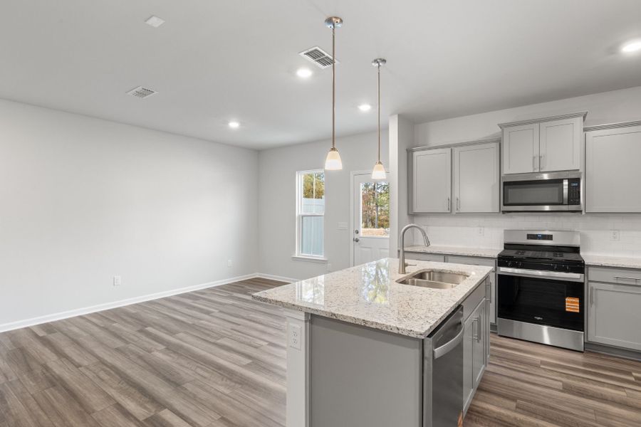 Furnished interior view inside a new home in Poets Walk, Whitsett (Image 6).