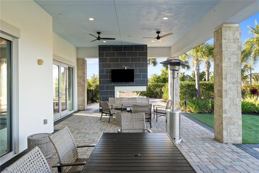 Exterior details and patio area of a home in Esplanade at Wiregrass Ranch, Wesley Chapel (Image 30).