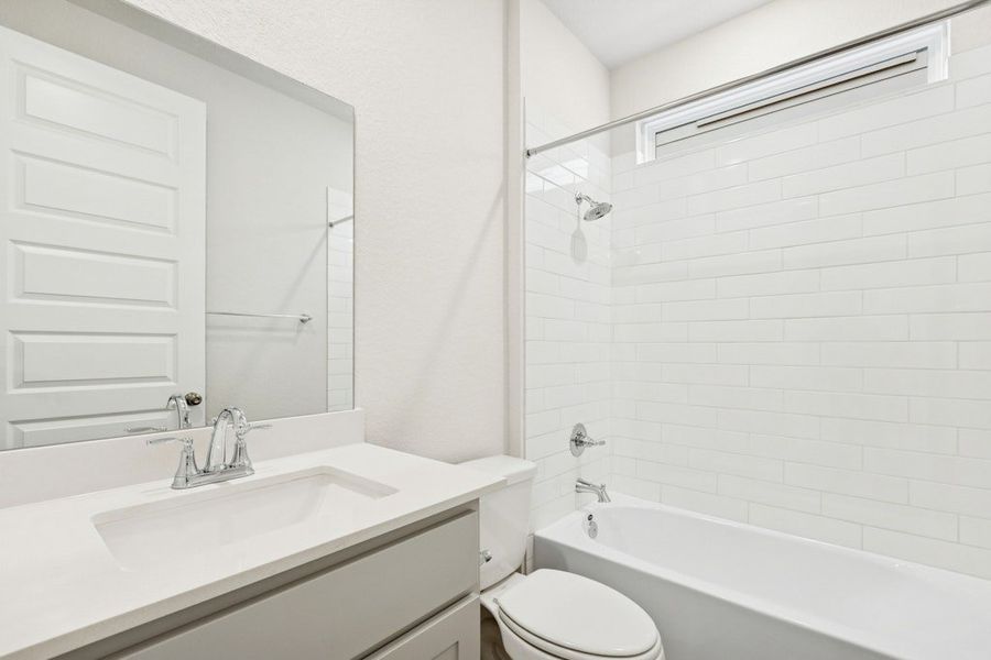 Furnished interior view inside a new home in University Heights, Round Rock (Image 11).