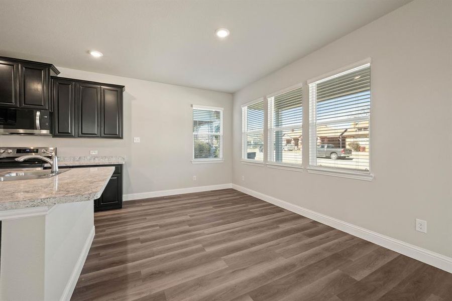 View of (flexible) Dining Room, 2-in white faux wood Blinds throughout