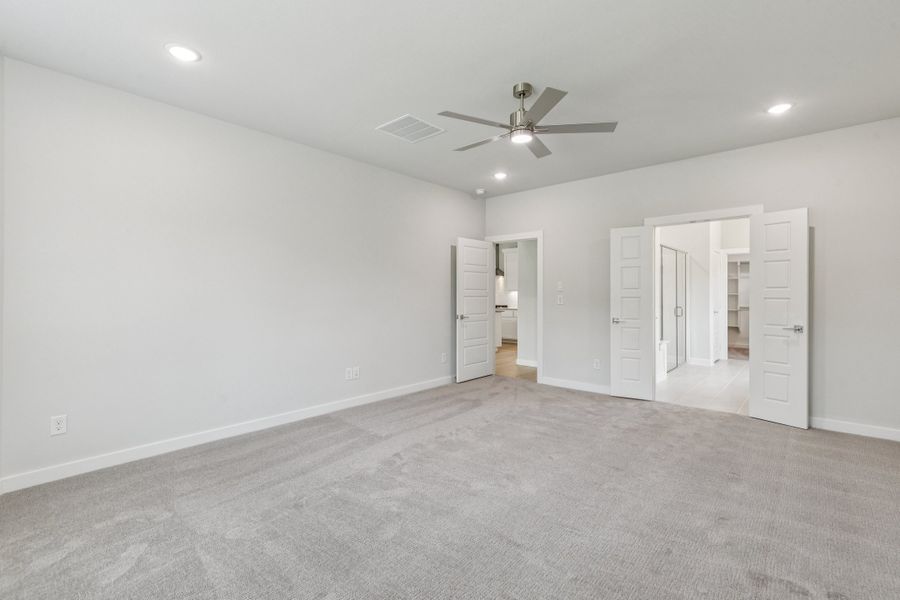 Primary Suite in the Mercury home plan by Trophy Signature Homes – REPRESENTATIVE PHOTO Primary Suite in the Mercury home plan by Trophy Signature Homes – REPRESENTATIVE PHOTO