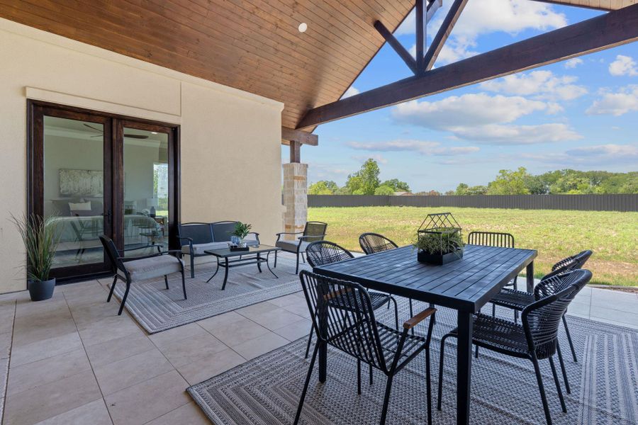 View of patio featuring outdoor dining area and an outdoor hangout area