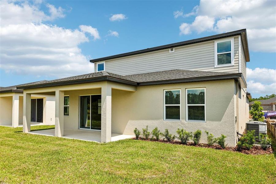 Exterior details and patio area of a home in Ridgehaven - Signature Series, Ormond Beach (Image 28). Exterior details and patio area of a home in Ridgehaven - Signature Series, Ormond Beach (Image 28).