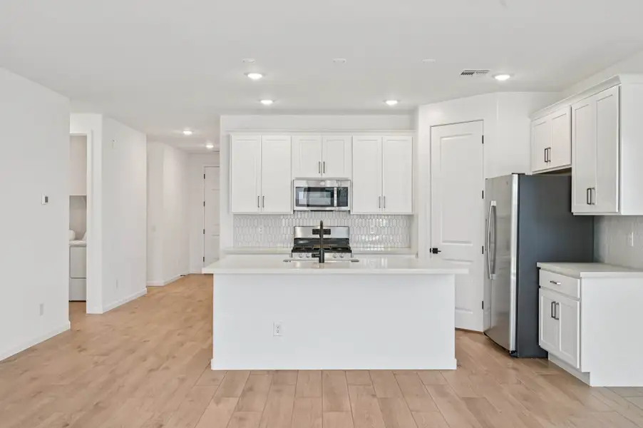 Kitchen featuring the Harmony Collection. Finishes and options may vary by community.