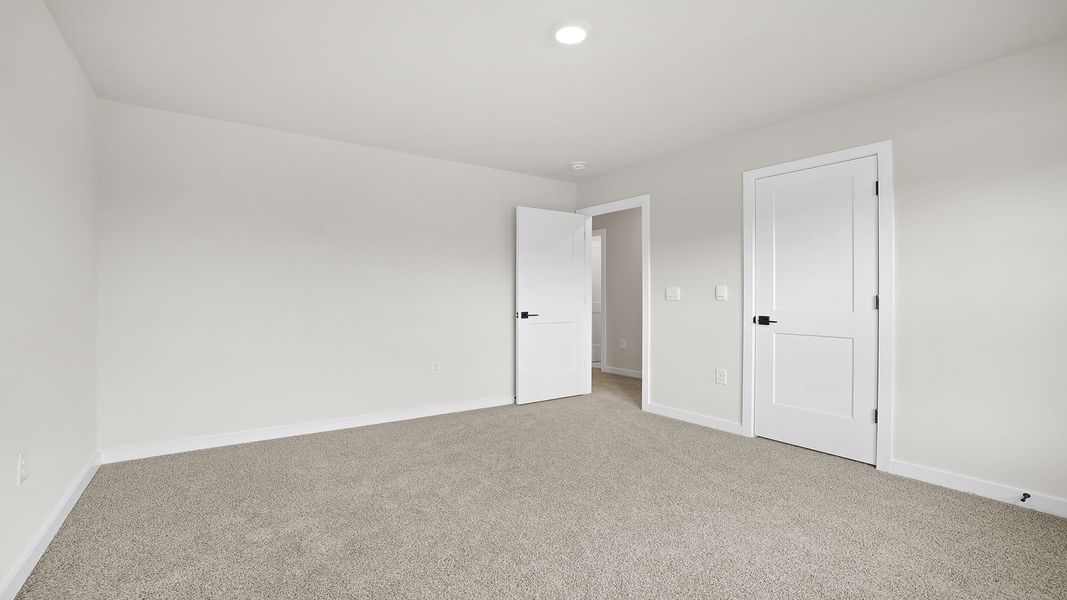 Representative unfurnished interior of a home built from the BERKSHIRE by D.R. Horton in Sycamore Cove, Woodruff (Image 26).