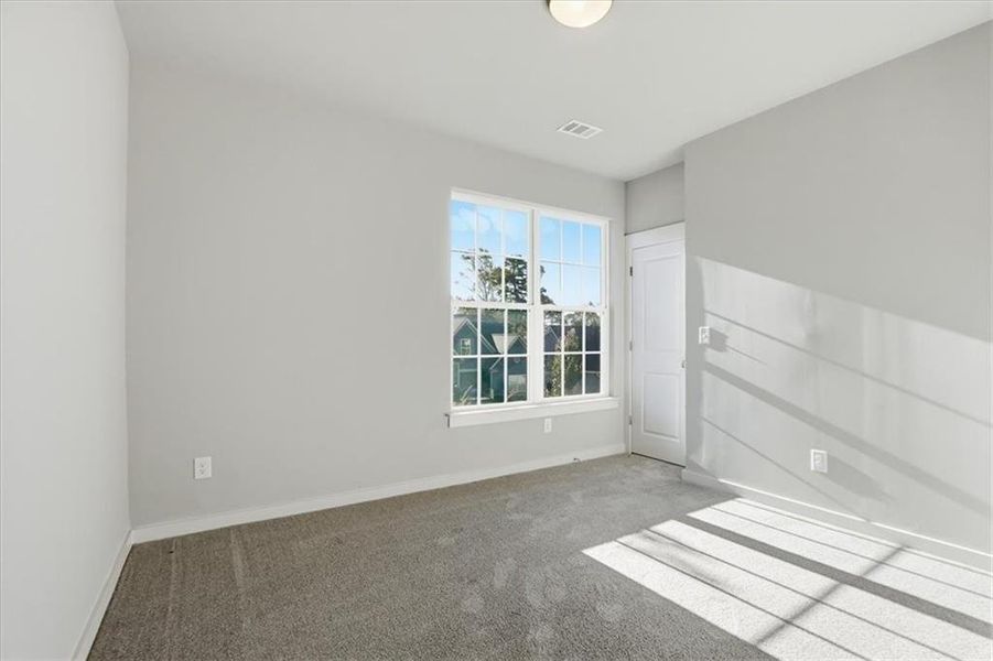 Spacious, unfurnished interior of a new home in Traditions of Braselton, Jefferson (Image 35).