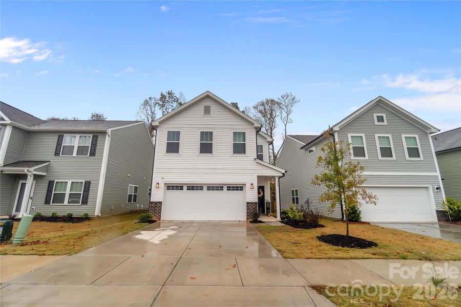Front exterior of a new home in Aubreywood, Charlotte, NC, highlighting curb appeal (Image 2).