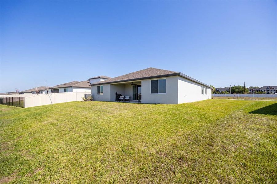 Exterior details and patio area of a home in The Grove at Stuart Crossing - Signature Series, Bartow (Image 3). Exterior details and patio area of a home in The Grove at Stuart Crossing - Signature Series, Bartow (Image 3).