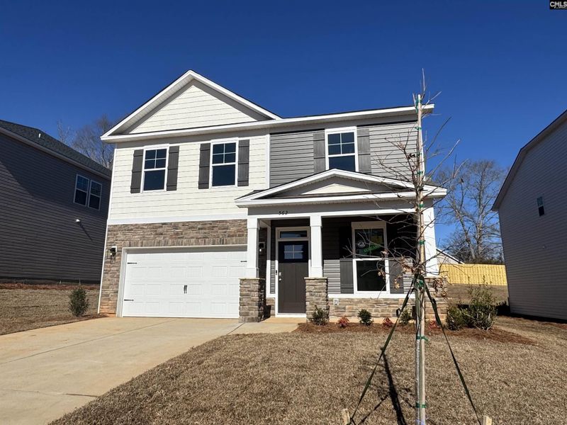 Front exterior of a new home in Boykin Hills, Chapin, SC, highlighting curb appeal (Image 1). Front exterior of a new home in Boykin Hills, Chapin, SC, highlighting curb appeal (Image 1).