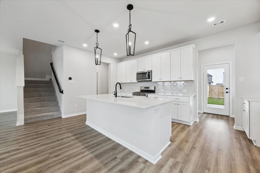 Furnished interior view inside a new home in Elyson, Katy (Image 8).