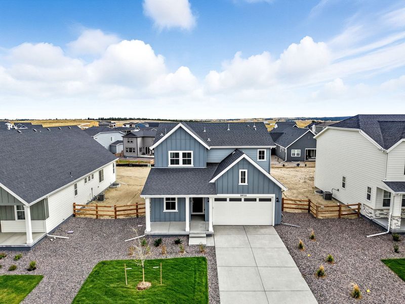 Representative exterior photo of a completed home built from the Estes by Taylor Morrison in The Town Collection at Independence, Elizabeth, CO (Image 2). Representative exterior photo of a completed home built from the Estes by Taylor Morrison in The Town Collection at Independence, Elizabeth, CO (Image 2).