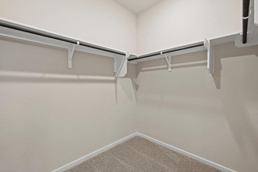 Walk-in closet in Primary Bedroom