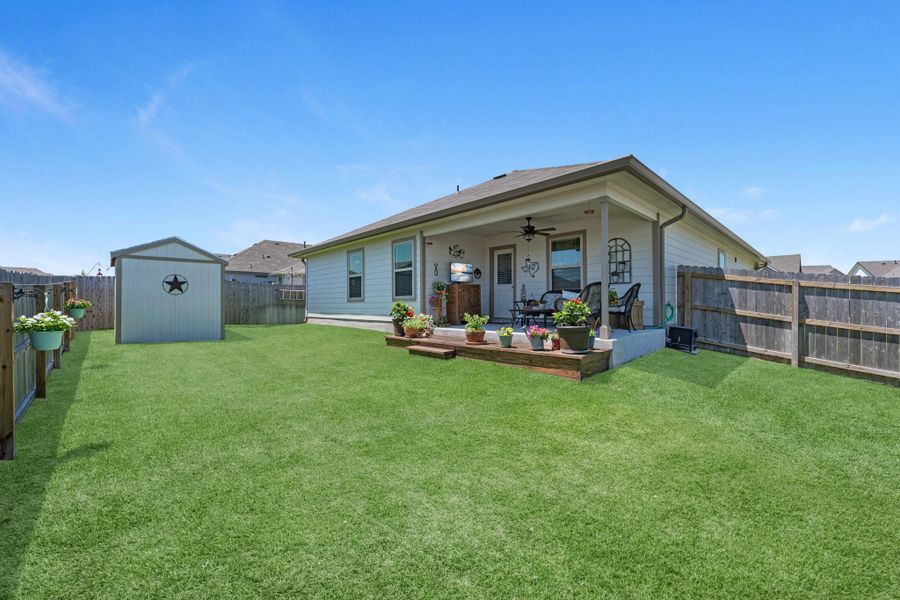 Exterior details and patio area of a home in Liberty Village, Brenham (Image 4).