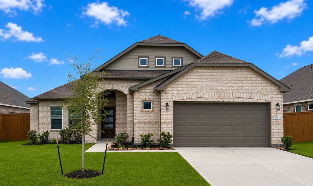 Front exterior of a new home in River Ranch, Dayton, TX, highlighting curb appeal (Image 1). Front exterior of a new home in River Ranch, Dayton, TX, highlighting curb appeal (Image 1).