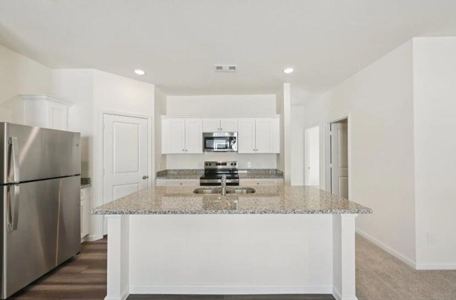 Furnished interior view inside a new home in , Ridgeville (Image 6).