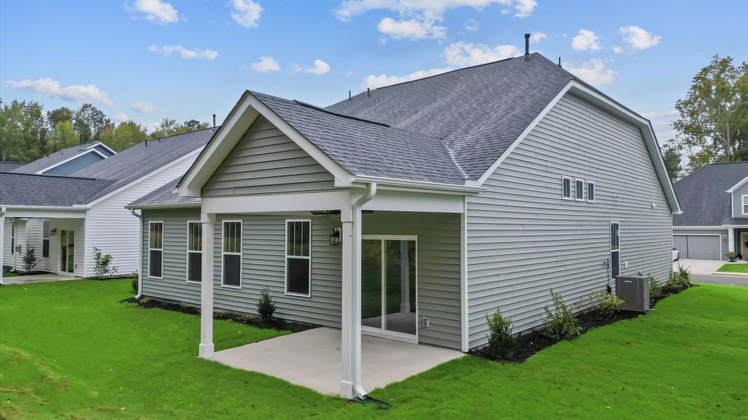 Exclusive rear covered porch with accomplished detail and elevated outdoor living potential