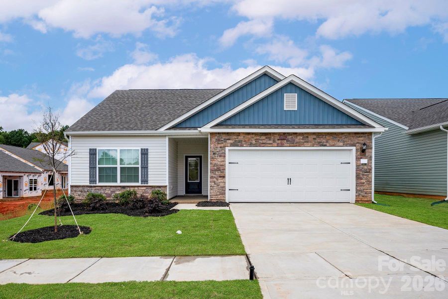 Front exterior of a new home in Ascot Woods, Charlotte, NC, highlighting curb appeal (Image 1). Front exterior of a new home in Ascot Woods, Charlotte, NC, highlighting curb appeal (Image 1).