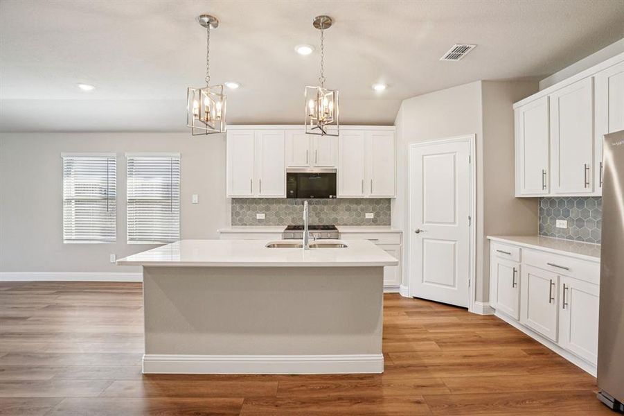 Photo is not of the actual home, but is an inspirational photo of builder’s model home and may depict options, furnishings, and/or decorator features that are not included.