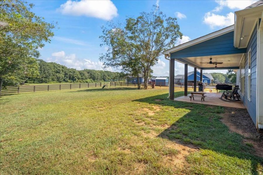 Front exterior of a new home in , Newborn, GA, highlighting curb appeal (Image 19).
