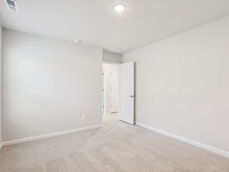 Spacious, unfurnished interior of a new home in Marshburn Landing - Signature Series, Wendell (Image 19).