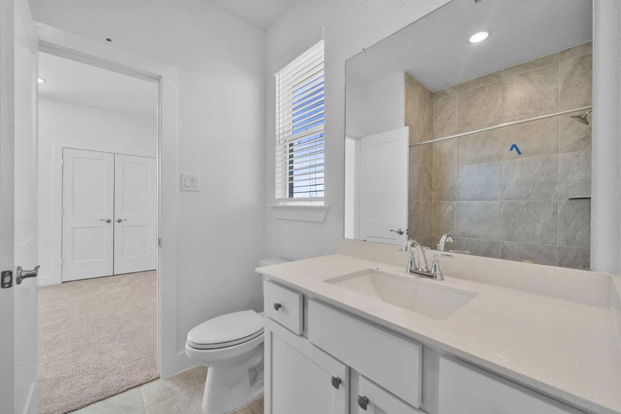 Furnished interior view inside a new home in Bridgeland, Cypress (Image 6).