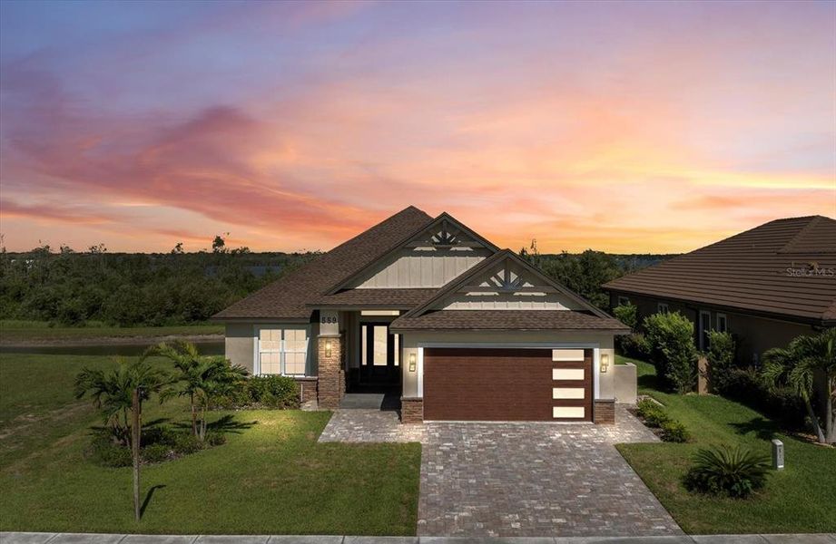 Front exterior of a new home in , Auburndale, FL, highlighting curb appeal (Image 24).