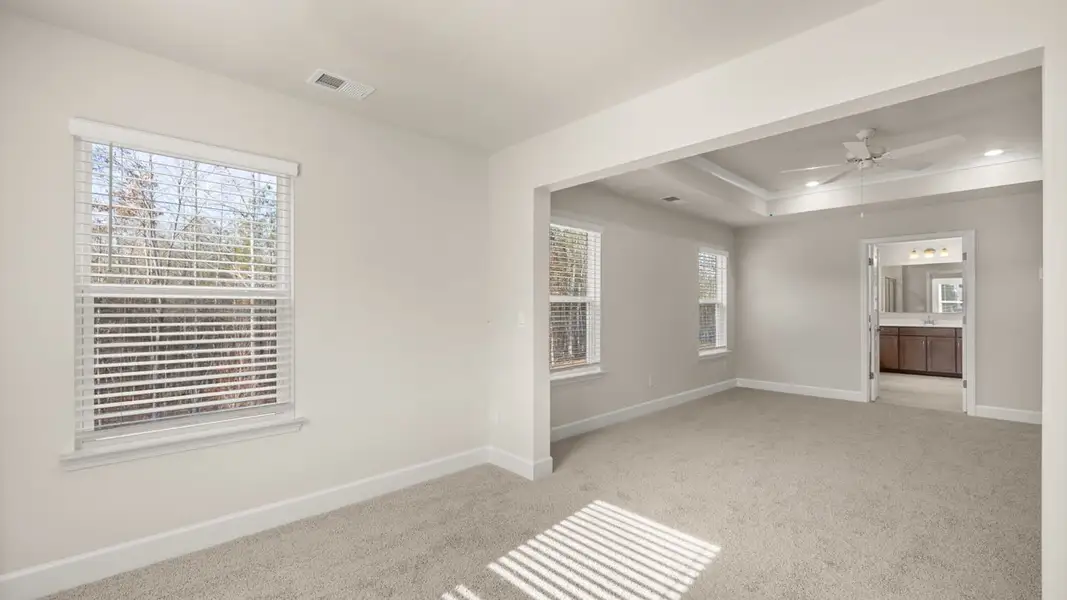 Representative unfurnished interior of a home built from the Hampshire by D.R. Horton in Heritage Pointe, Senoia (Image 31).